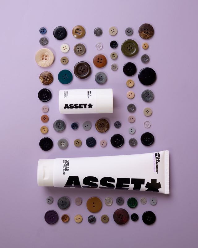 Products on lilac among buttons, Asset by David Spector
