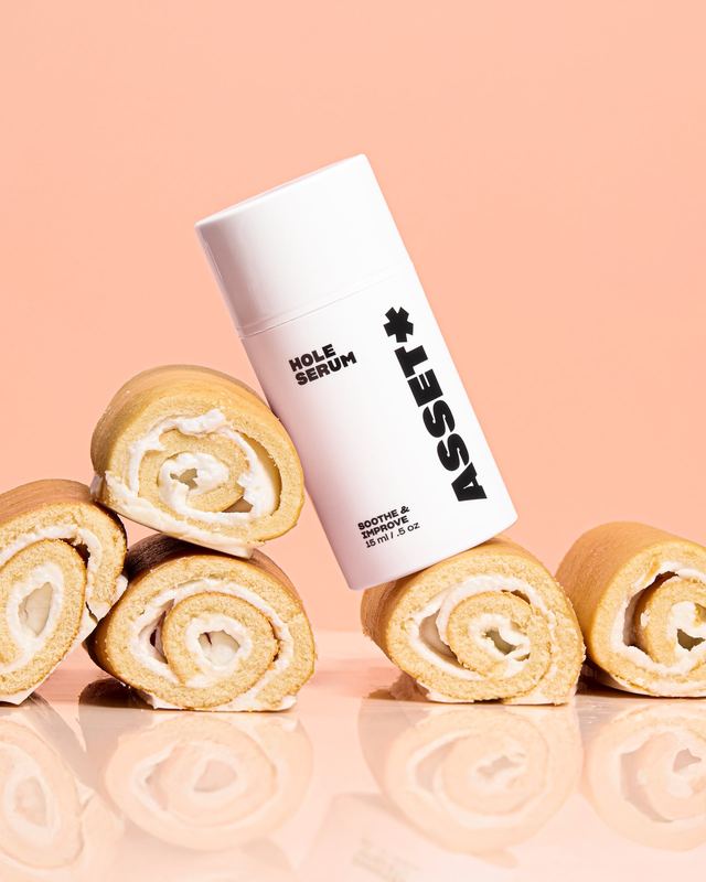 Serum balanced on cake rolls, Asset by David Spector