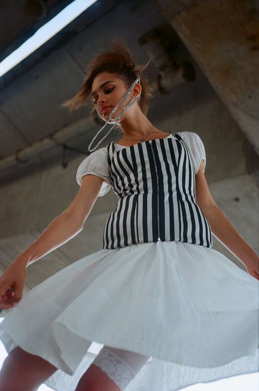 Mid-twirl in a striped bodice, Lala Olsson by David Spector