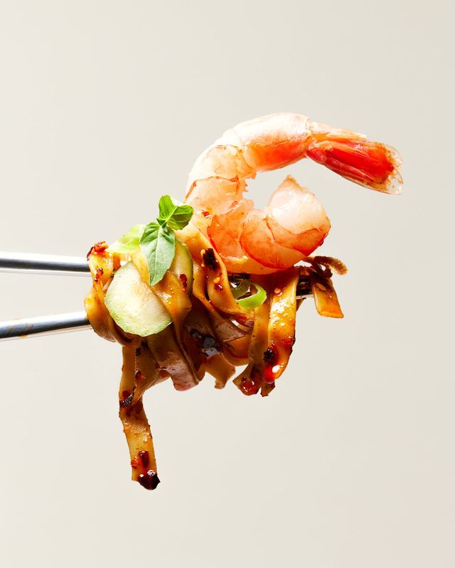 Shrimp and noodles on chopsticks, Momofuku by David Spector