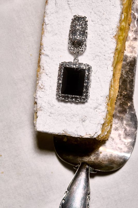 Pendant on a cake server, Mudpearl by David Spector