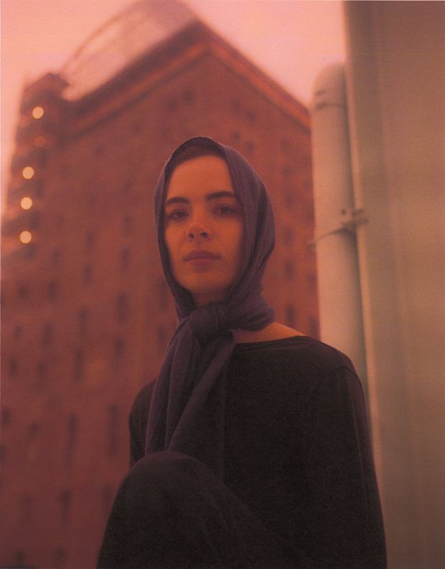 Headscarf portrait by a building, Orange Sky Portraits by David Spector