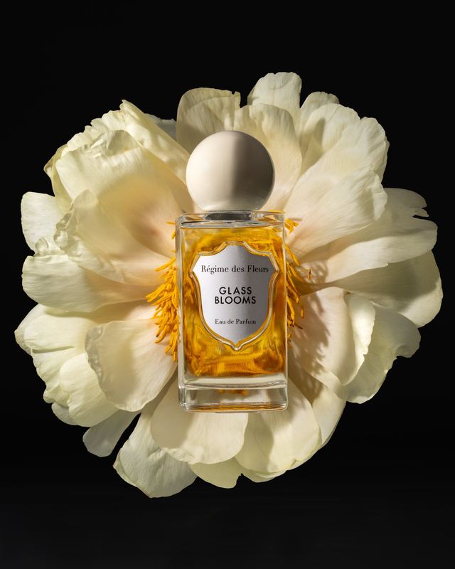 Bottle set in a white peony, Régime des Fleurs by David Spector
