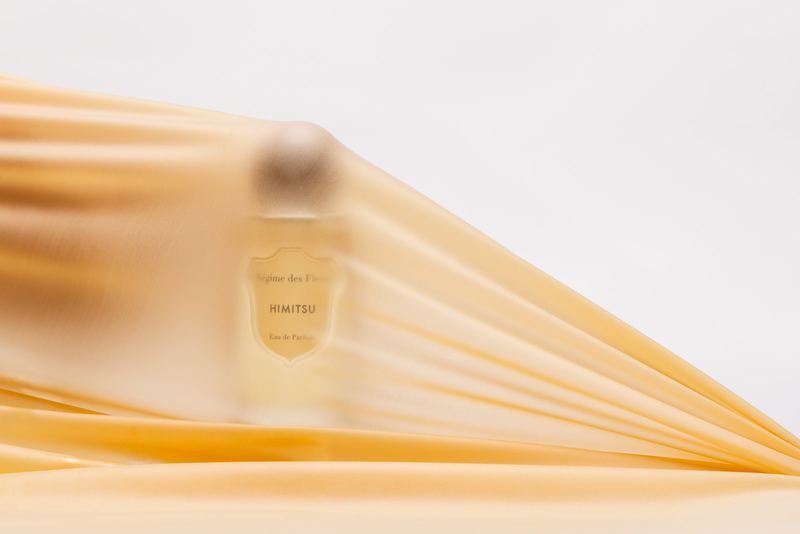 Bottle through a wash of golden light, Régime des Fleurs by David Spector