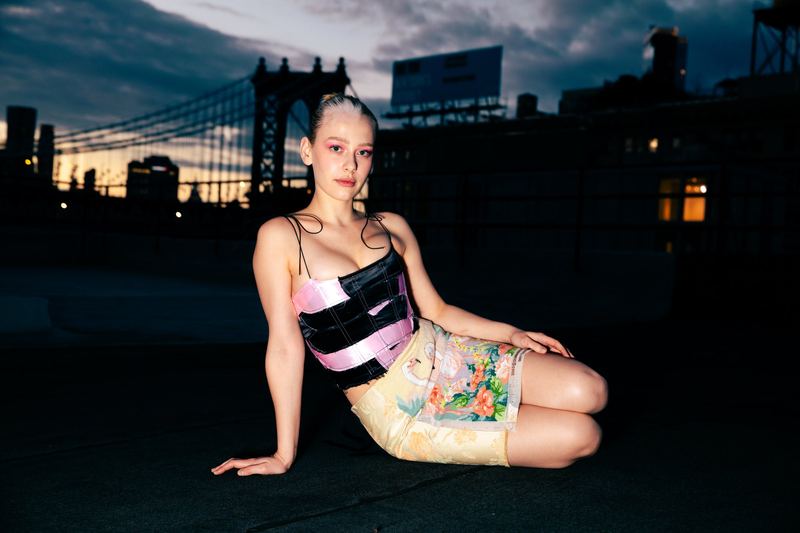 Seated on a rooftop at night, Tia Jonsson, i-D by David Spector