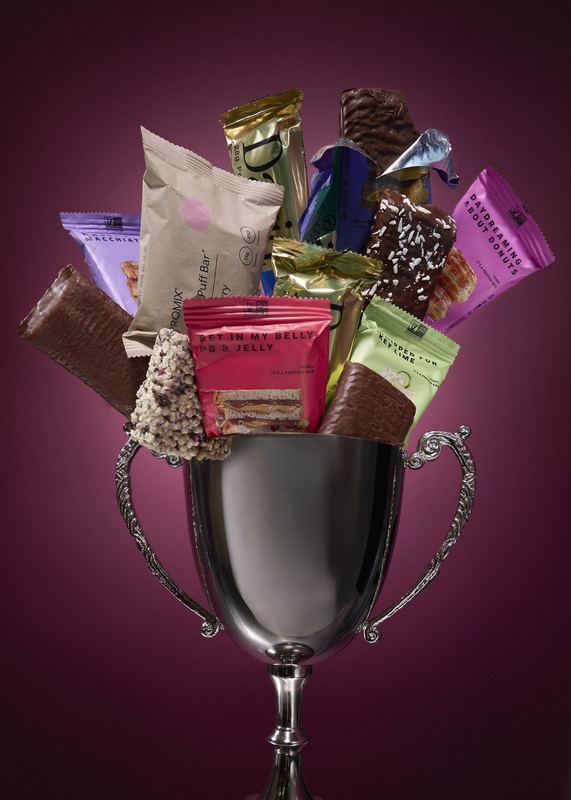 Snack bars piled high in a silver trophy, Bon Appétit by David Spector