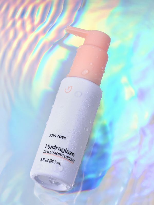 Bottle on holographic foil, Jovi Rose by David Spector