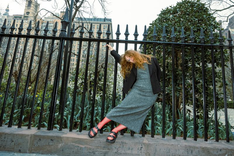 Leaning on a park railing, Ruby McColister by David Spector