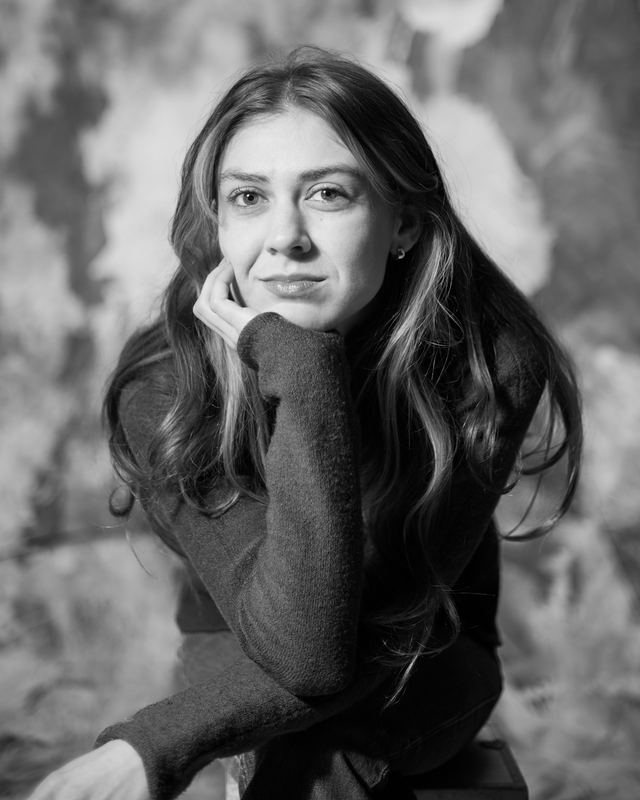 Black and white portrait, chin on hand, Madeline Cash by David Spector