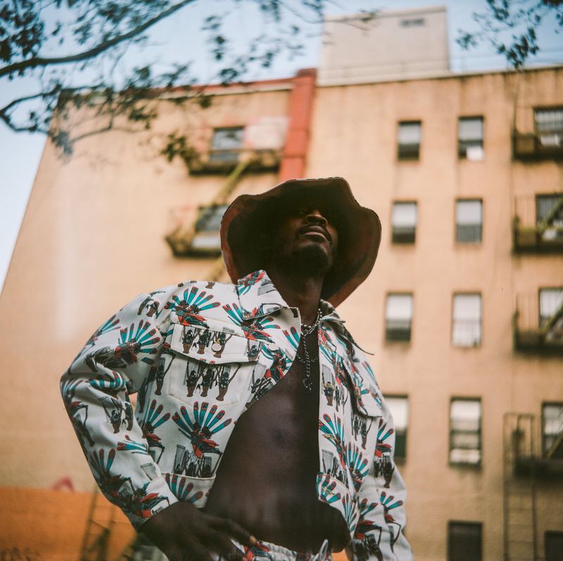 Low angle in a printed set and bucket hat, Nosesso LA by David Spector