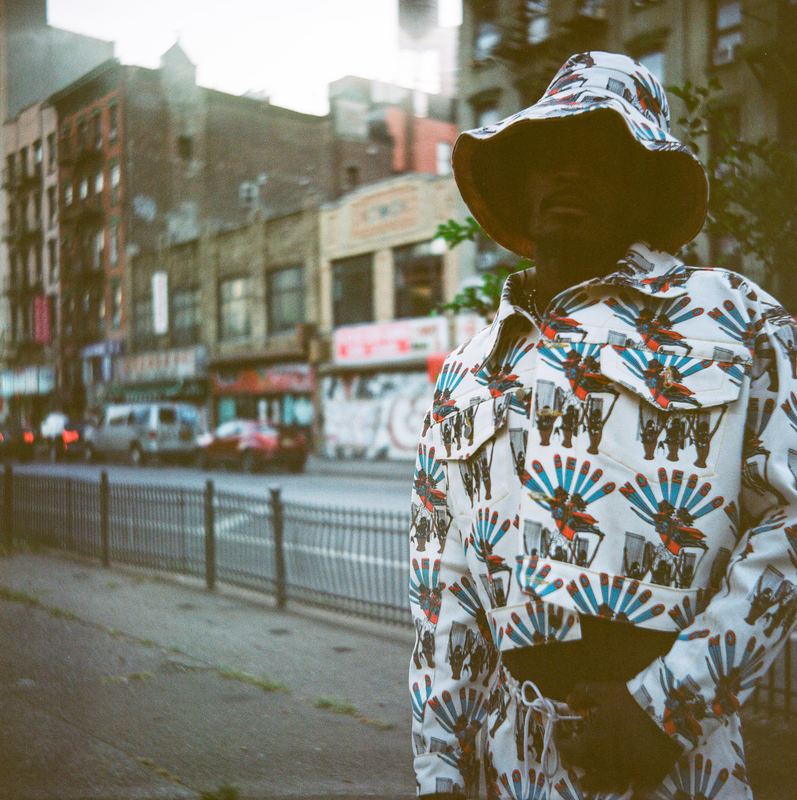Hat brim over the eyes on the street, Nosesso LA by David Spector
