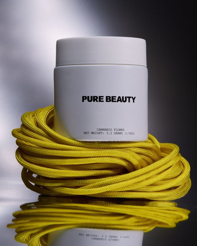 White jar on coiled yellow cable, Pure Beauty by David Spector