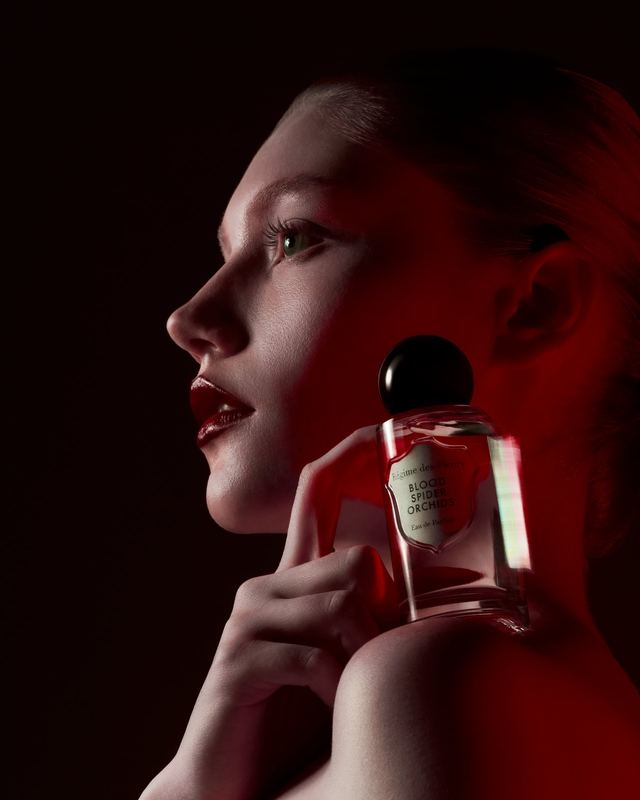 Profile, holding the bottle at the neck, Blood Spider Orchids by David Spector