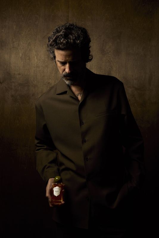 Portrait with the bottle in low light, Falling Trees by David Spector
