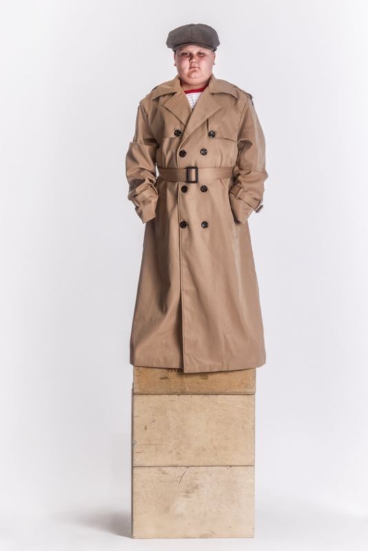 Trench coat on a stone plinth, Rizzler by David Spector