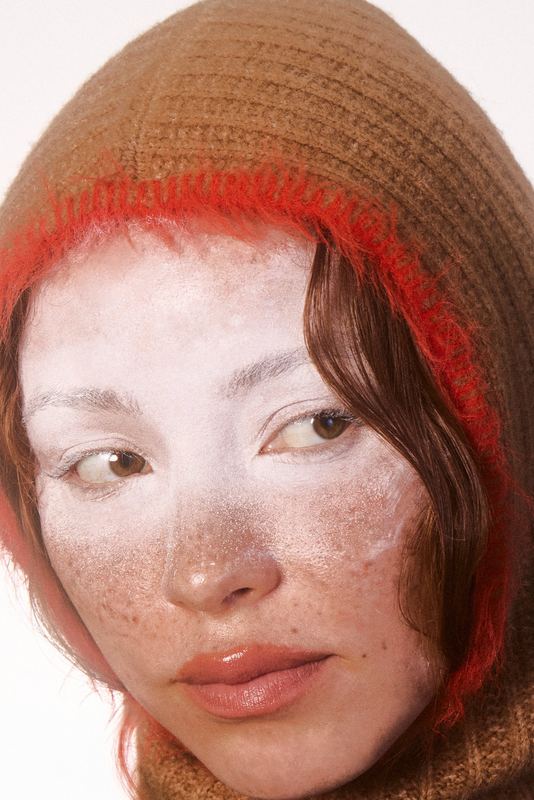 Frosted face in a brown knit hood, Snow Editorial by David Spector