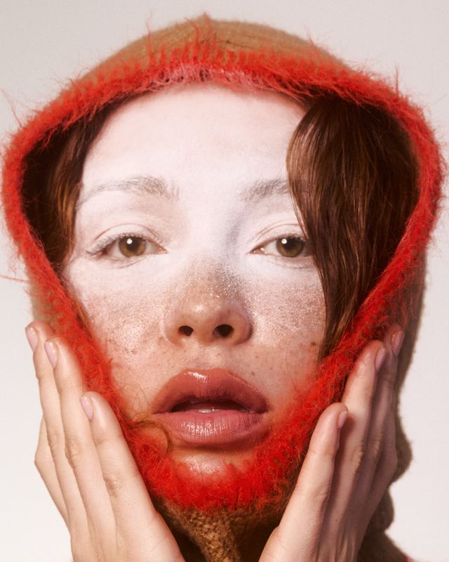 Hands to the face in a knit hood, Snow Editorial by David Spector