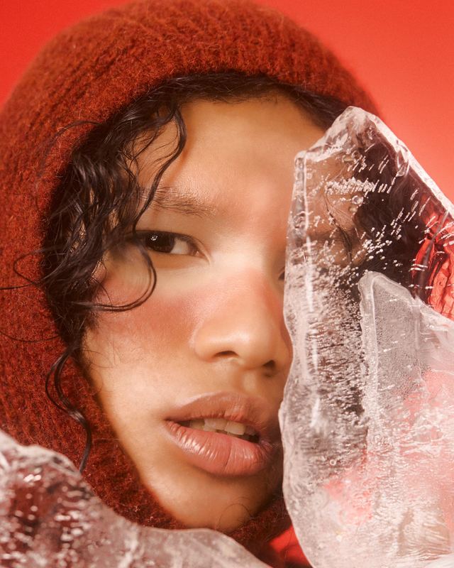 Holding a shard of ice, Snow Editorial by David Spector